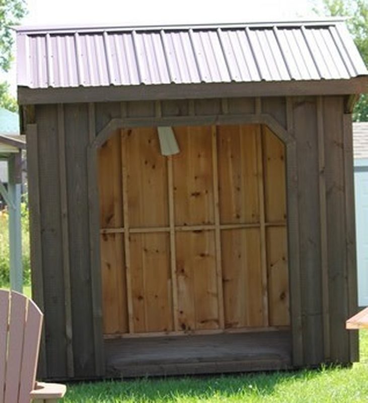 10x14 Quaker Shed, Rustic Cedar stain, Et. Cedar roof, shown with optional Heritage Siding, Arched Doors, Gable Vents, Flower Boxes, 18' Cedar Carlisle Cupola w/Flag Weathervane, 4x5 Ramp